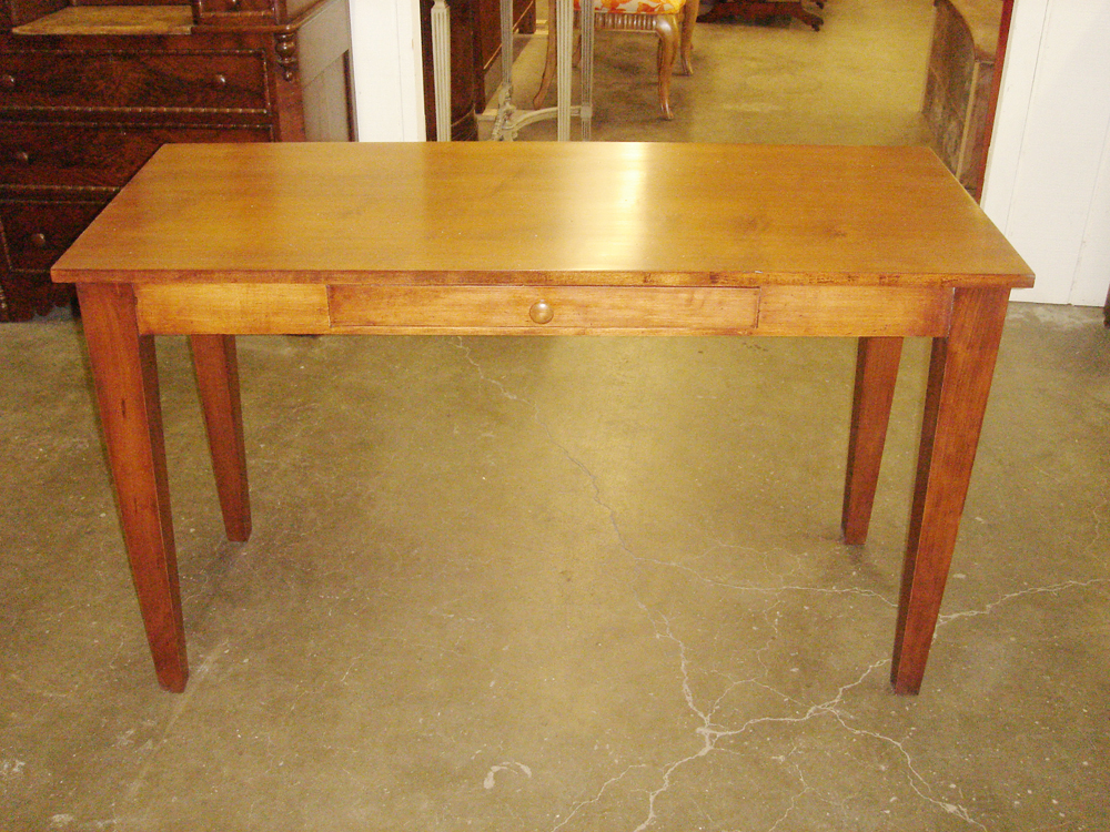 American style table built by Prestige.