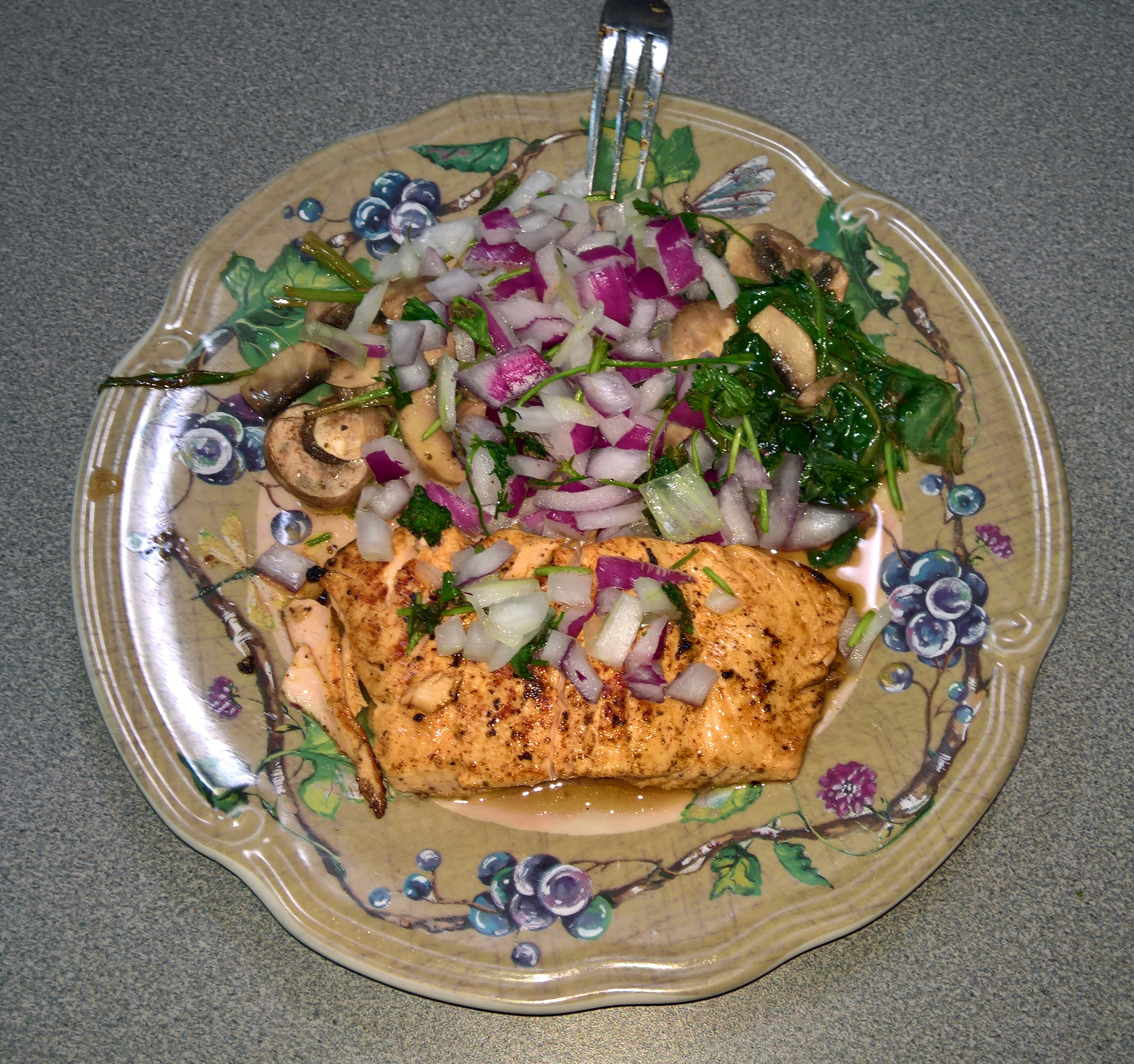 Percy cooking pan seared Salmon with mushrooms and spinach